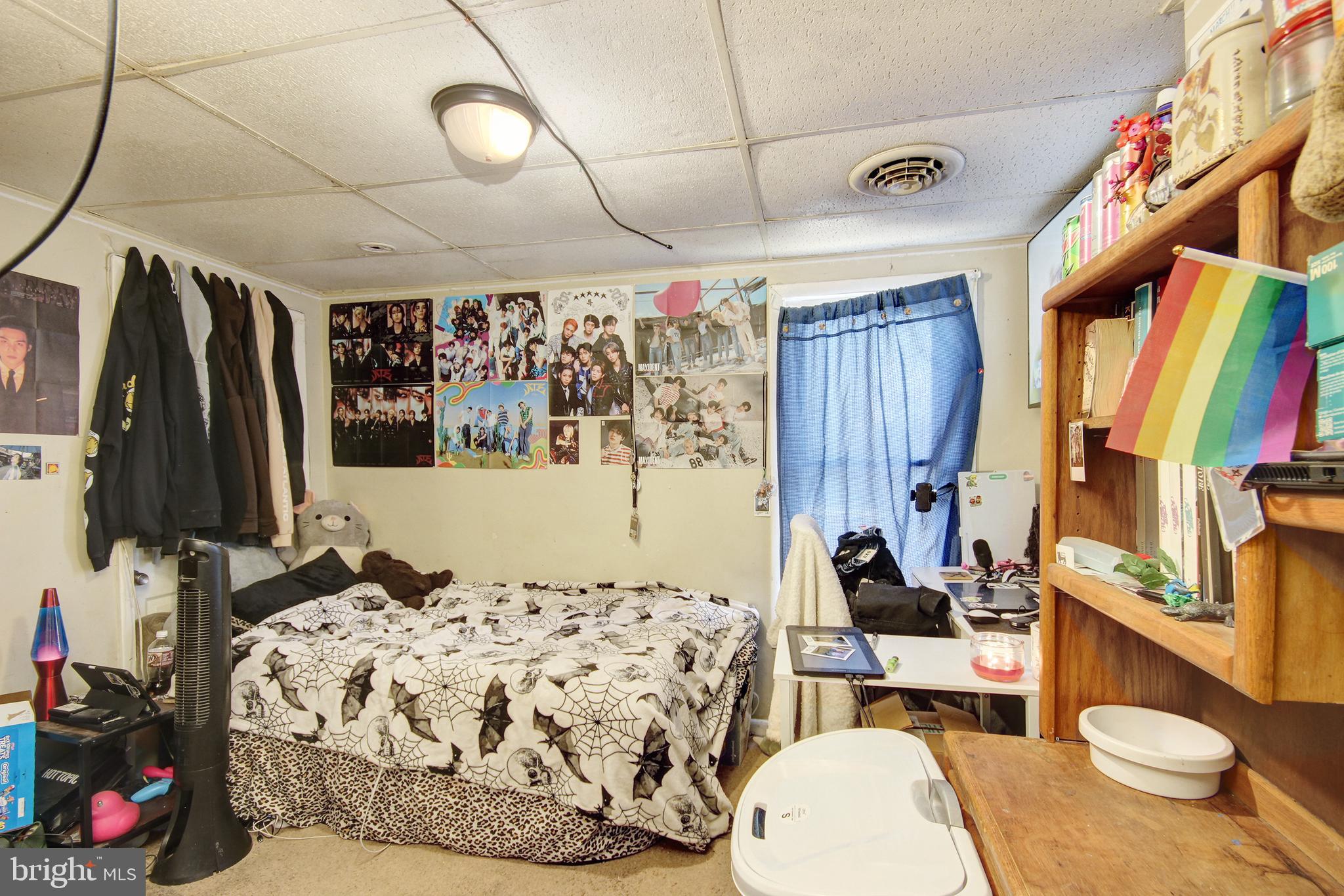 11 West Chestnut Street Delmar, MD 21875 - Photo 8 of 14 a bed room with a bed and a couch