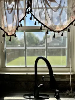 a view of swimming pool from a window