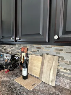a kitchen with a sink and a stove top oven