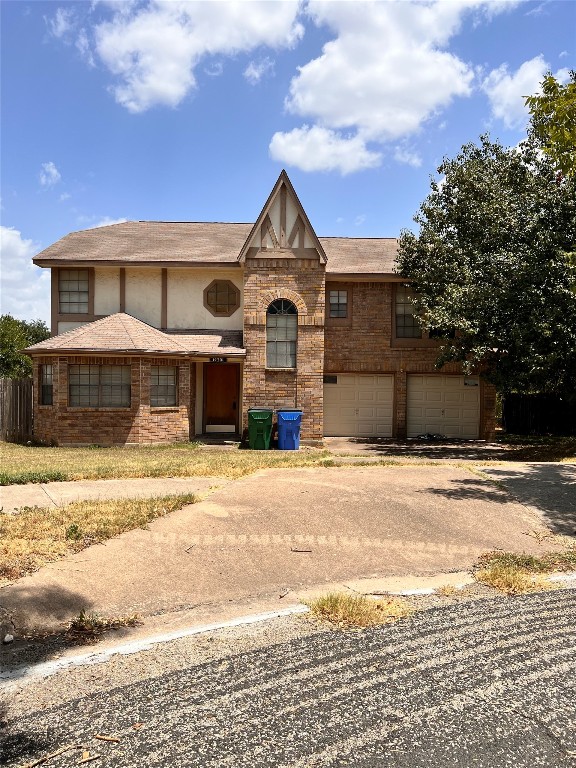 14301 Weldon Lane Austin, TX 78728 - Photo 1 of 1 a front view of a house with a yard