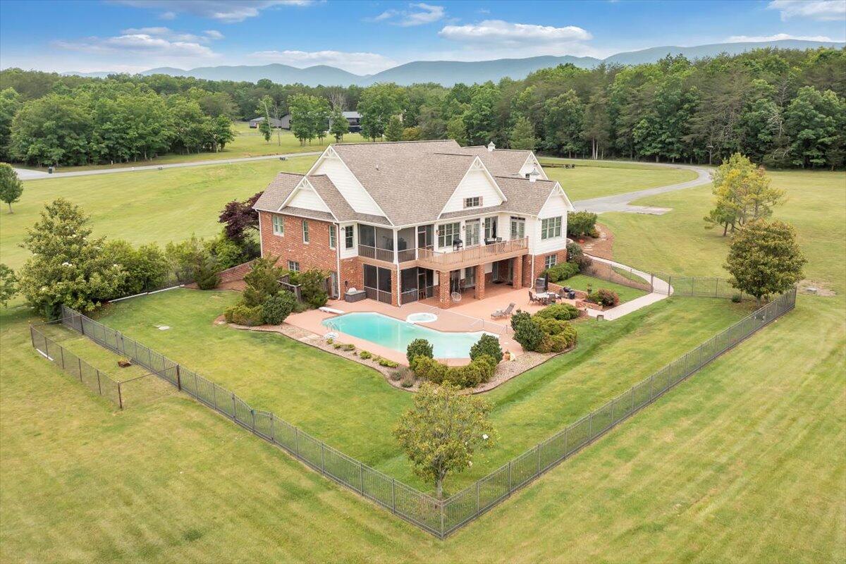 400 Quail Ridge Drive Fincastle, VA 24090 - Photo 108 of 113 a view of a house with a big yard and large trees