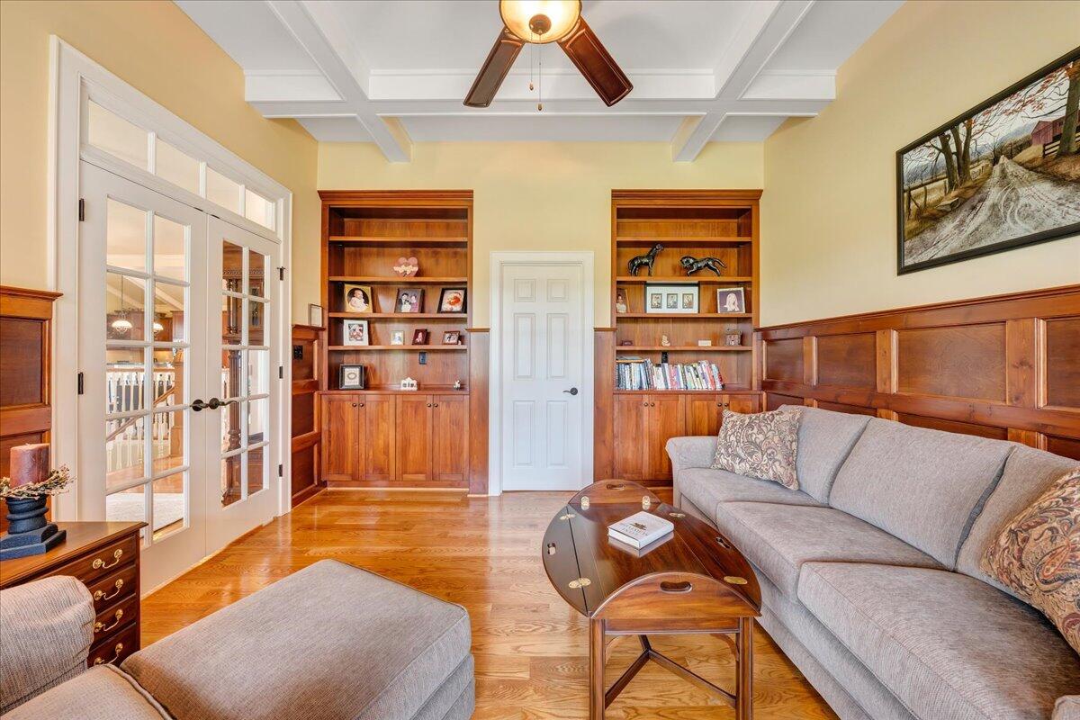 400 Quail Ridge Drive Fincastle, VA 24090 - Photo 13 of 113 a living room with furniture and a floor to ceiling window