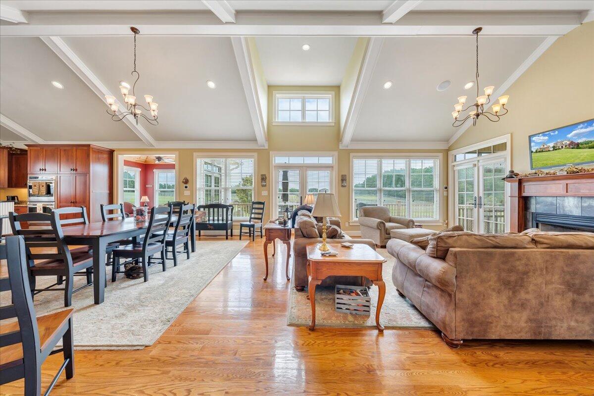 400 Quail Ridge Drive Fincastle, VA 24090 - Photo 16 of 113 a living room with furniture dining table a large window and stainless steel appliances