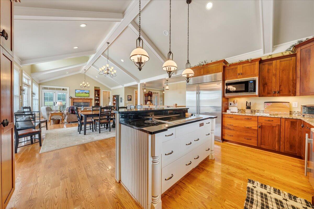 400 Quail Ridge Drive Fincastle, VA 24090 - Photo 25 of 113 a kitchen with stainless steel appliances granite countertop a stove and cabinets