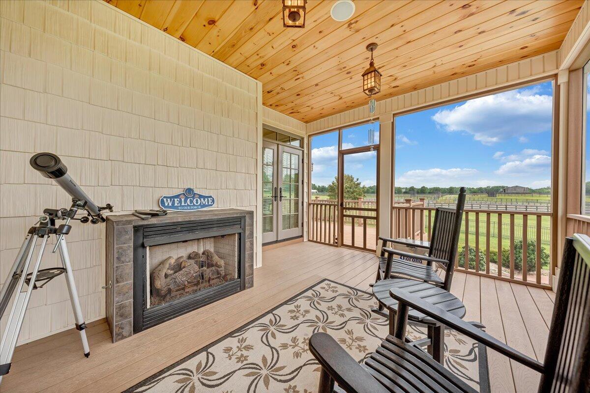 400 Quail Ridge Drive Fincastle, VA 24090 - Photo 39 of 113 a living room with furniture a large window with wooden floor