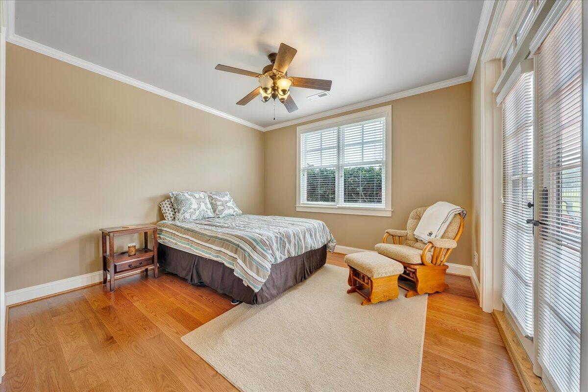 400 Quail Ridge Drive Fincastle, VA 24090 - Photo 54 of 113 a bedroom with a bed chairs and window