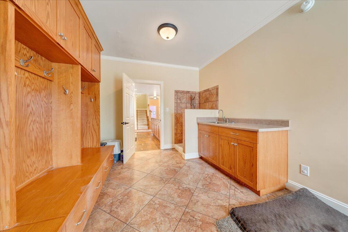 400 Quail Ridge Drive Fincastle, VA 24090 - Photo 59 of 113 a view of a kitchen with a sink and a refrigerator