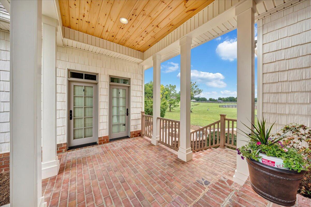 400 Quail Ridge Drive Fincastle, VA 24090 - Photo 72 of 113 a view of a porch with wooden floor
