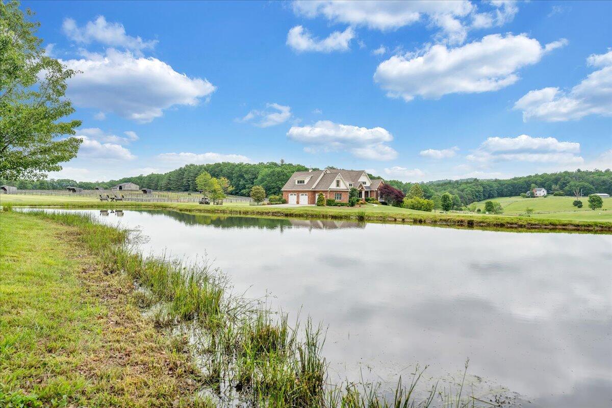 400 Quail Ridge Drive Fincastle, VA 24090 - Photo 98 of 113 a view of a lake with houses in the back