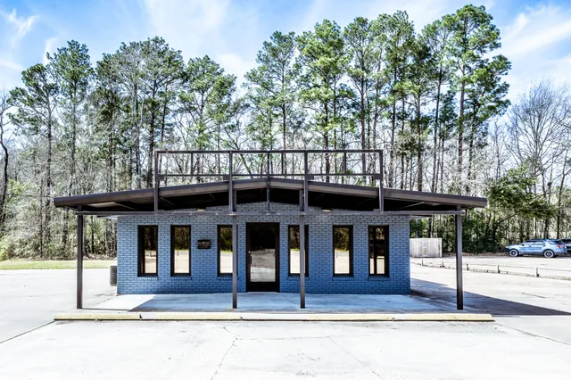 a front view of a house with a porch