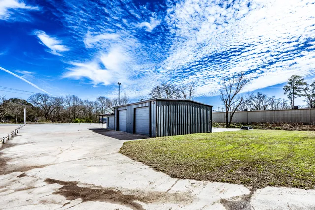a view of a backyard of the house