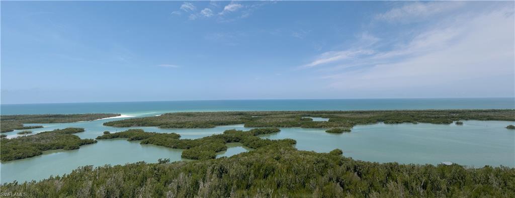 13925 Old Coast Road, Unit 2201 Naples, FL 34110 - Photo 18 of 28 a view of lake with boats