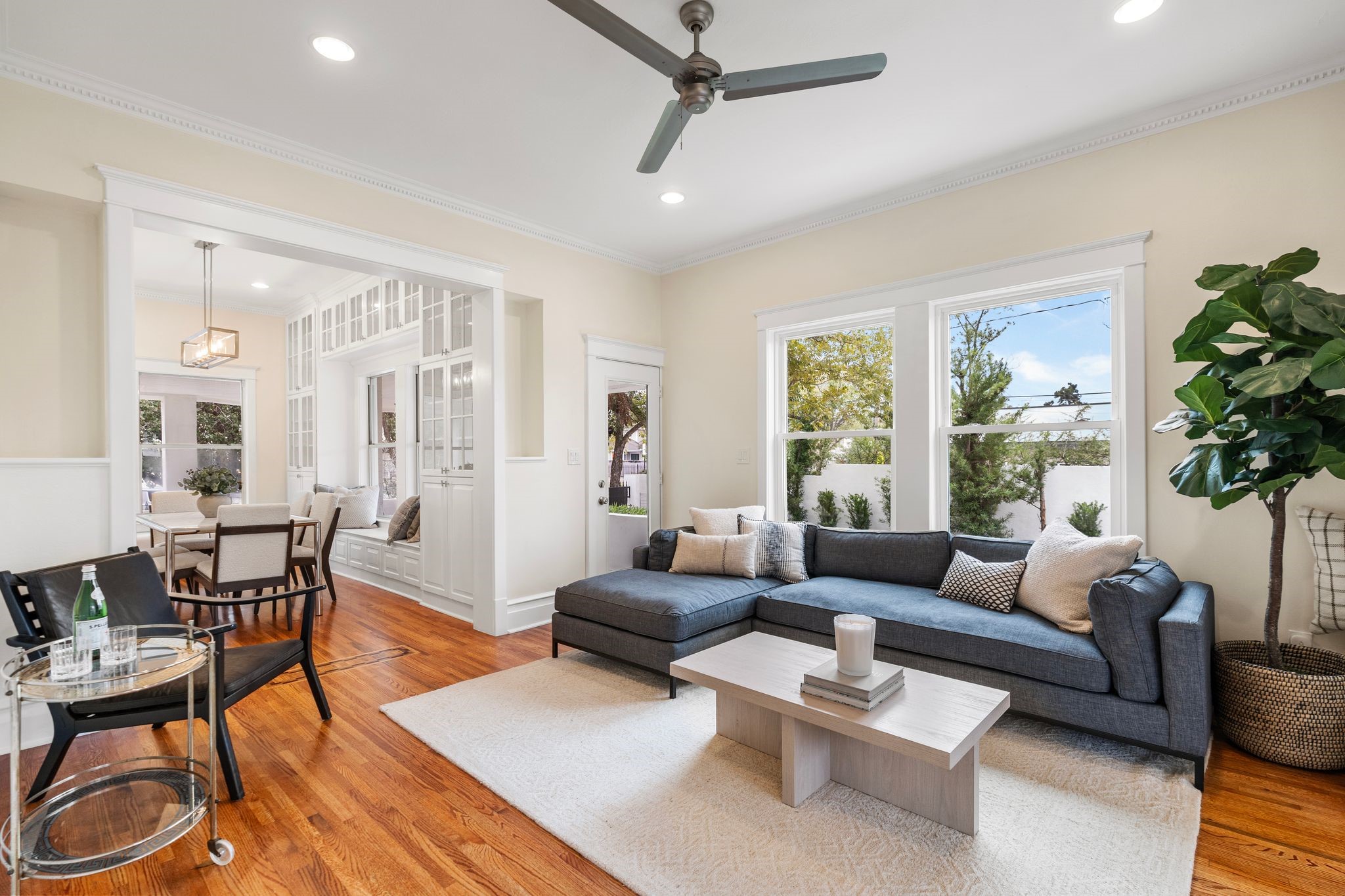 607 Harvard Street Houston, TX 77007 - Photo 14 of 50 Accessible from the dining room, kitchen, and front and rear porches, this spacious den/family room is sure to become a favorite gathering place.
