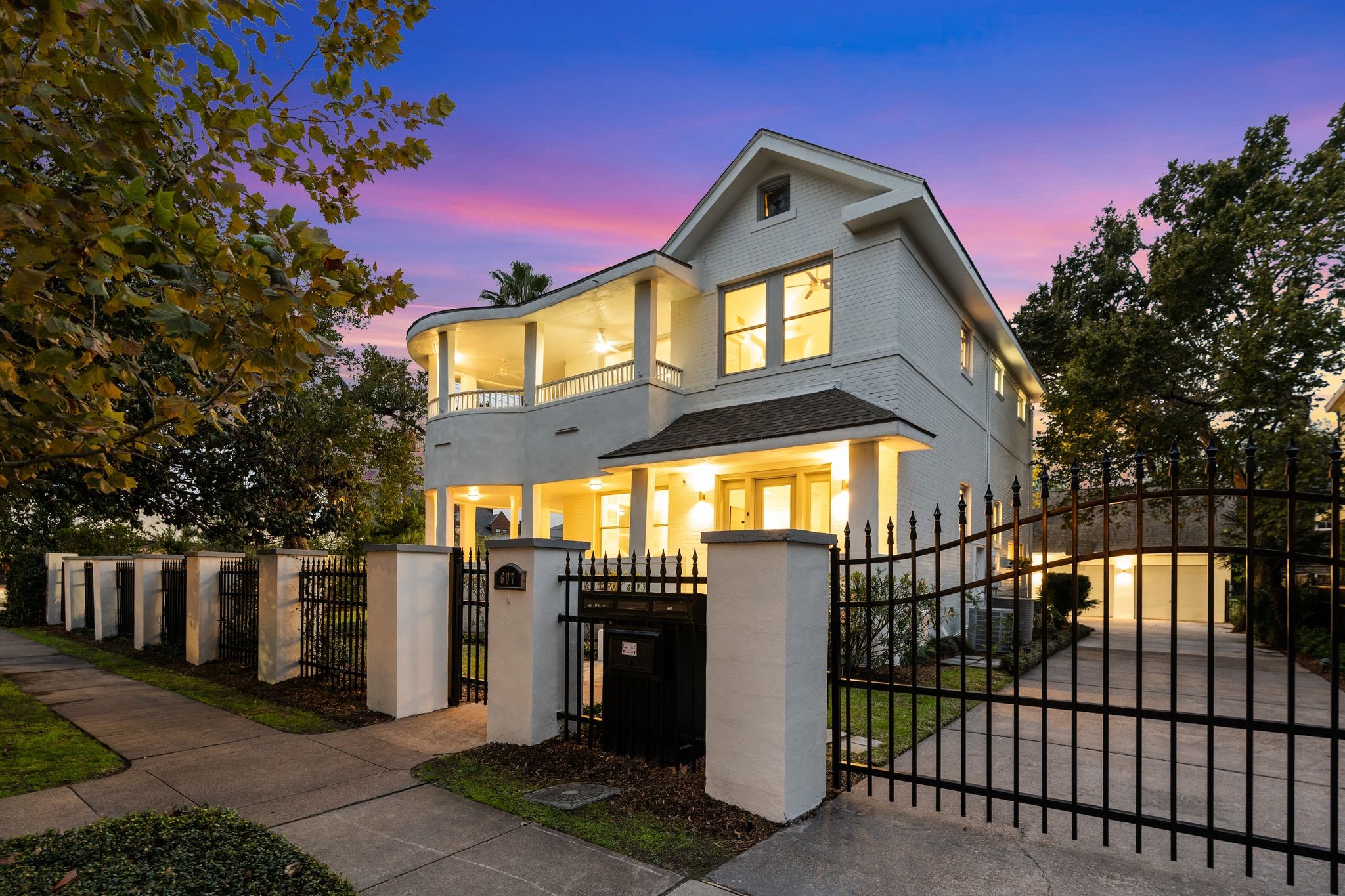 607 Harvard Street Houston, TX 77007 - Photo 43 of 50 Enjoy plenty of secure off-street parking thanks to the long gated driveway and three-bay garage with EV charging.