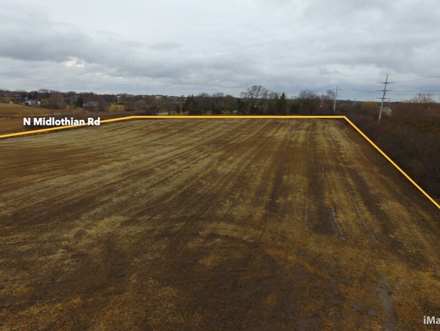 O Midlothian Road Hawthorn Woods, IL 60047 - Photo 8 of 12 a view of a swimming pool and an outdoor seating