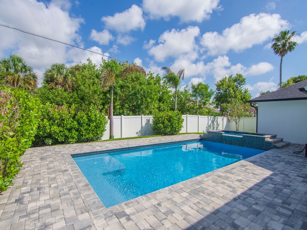 431 Midvale Terrace Sebastian, FL 32958 - Photo 4 of 34 a view of a swimming pool with an outdoor space