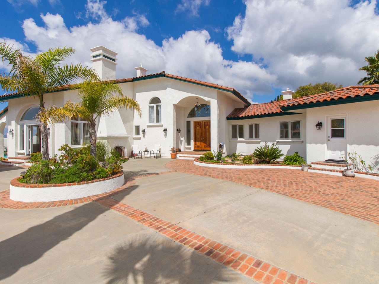 898 Burma Road Fallbrook, CA 92028 - Photo 2 of 25 Beautiful front doors with chandelier entry way with outdoor fireplace.