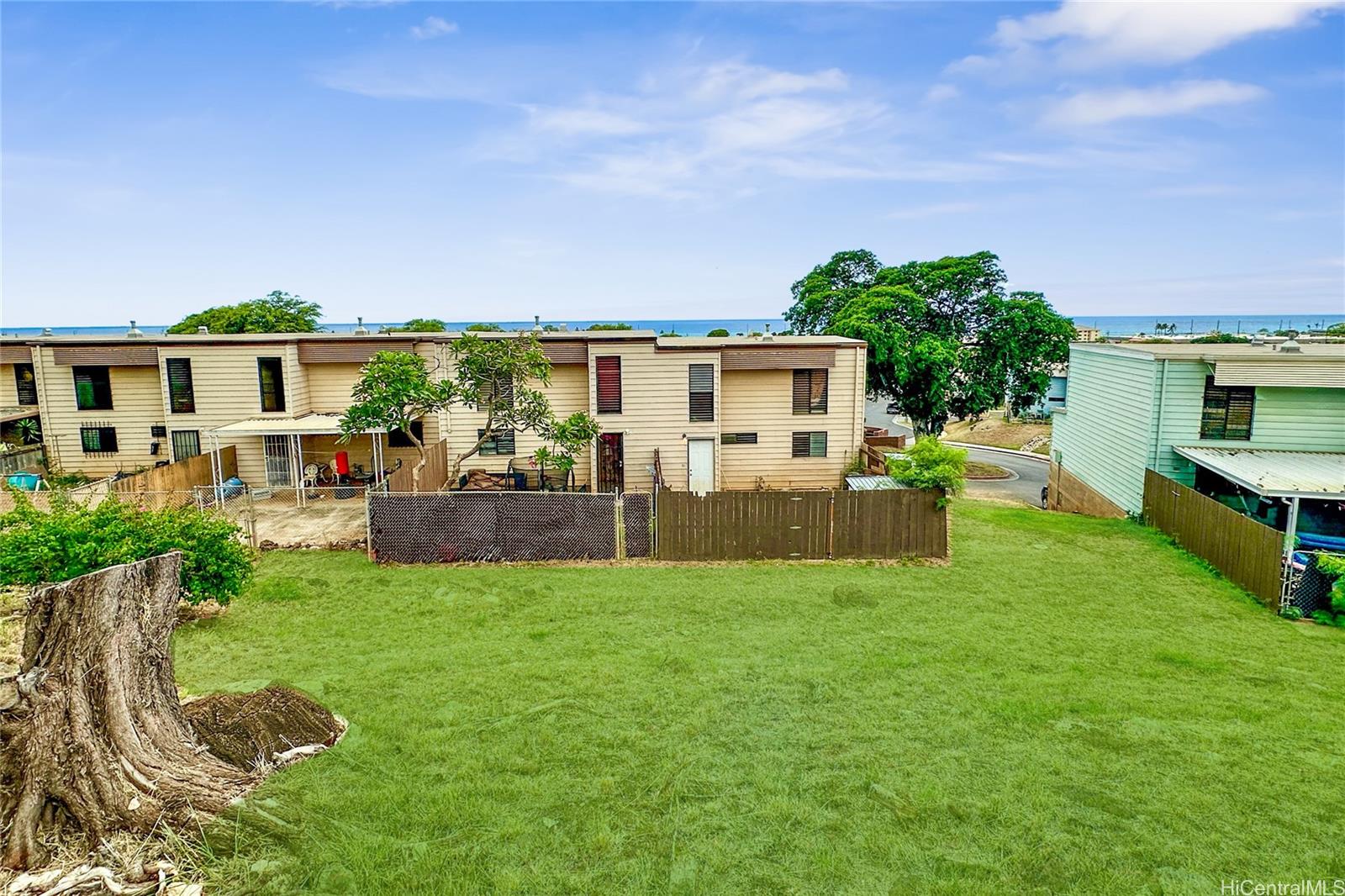 87217 Helelua Street, Unit 1 Waianae, HI 96792 - Photo 5 of 15 a view of an house with backyard porch and furniture