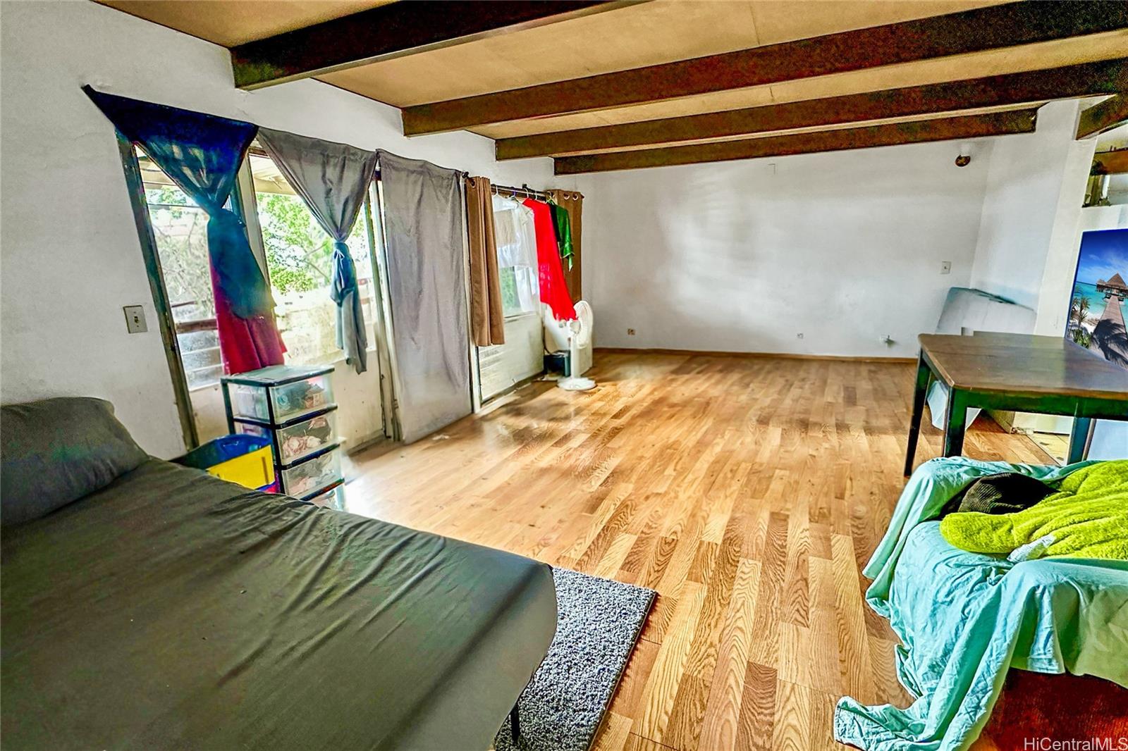 87217 Helelua Street, Unit 1 Waianae, HI 96792 - Photo 7 of 15 a view of outdoor space with wooden floor and windows