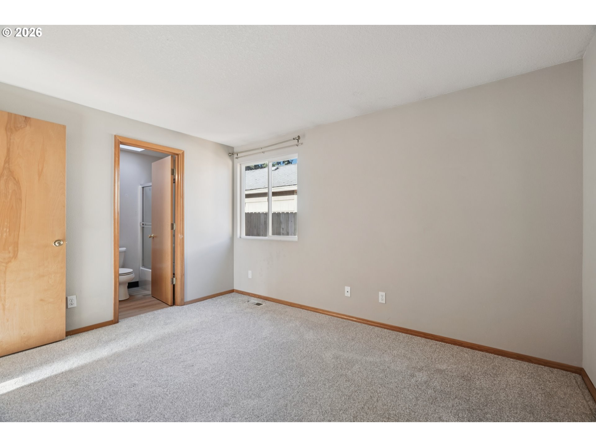 7306 Southeast 76th Avenue Portland, OR 97206 - Photo 19 of 34 a view of an empty room with a window
