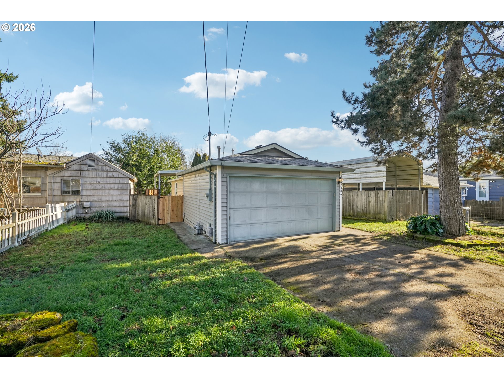 7306 Southeast 76th Avenue Portland, OR 97206 - Photo 2 of 34 a view of a backyard of a house