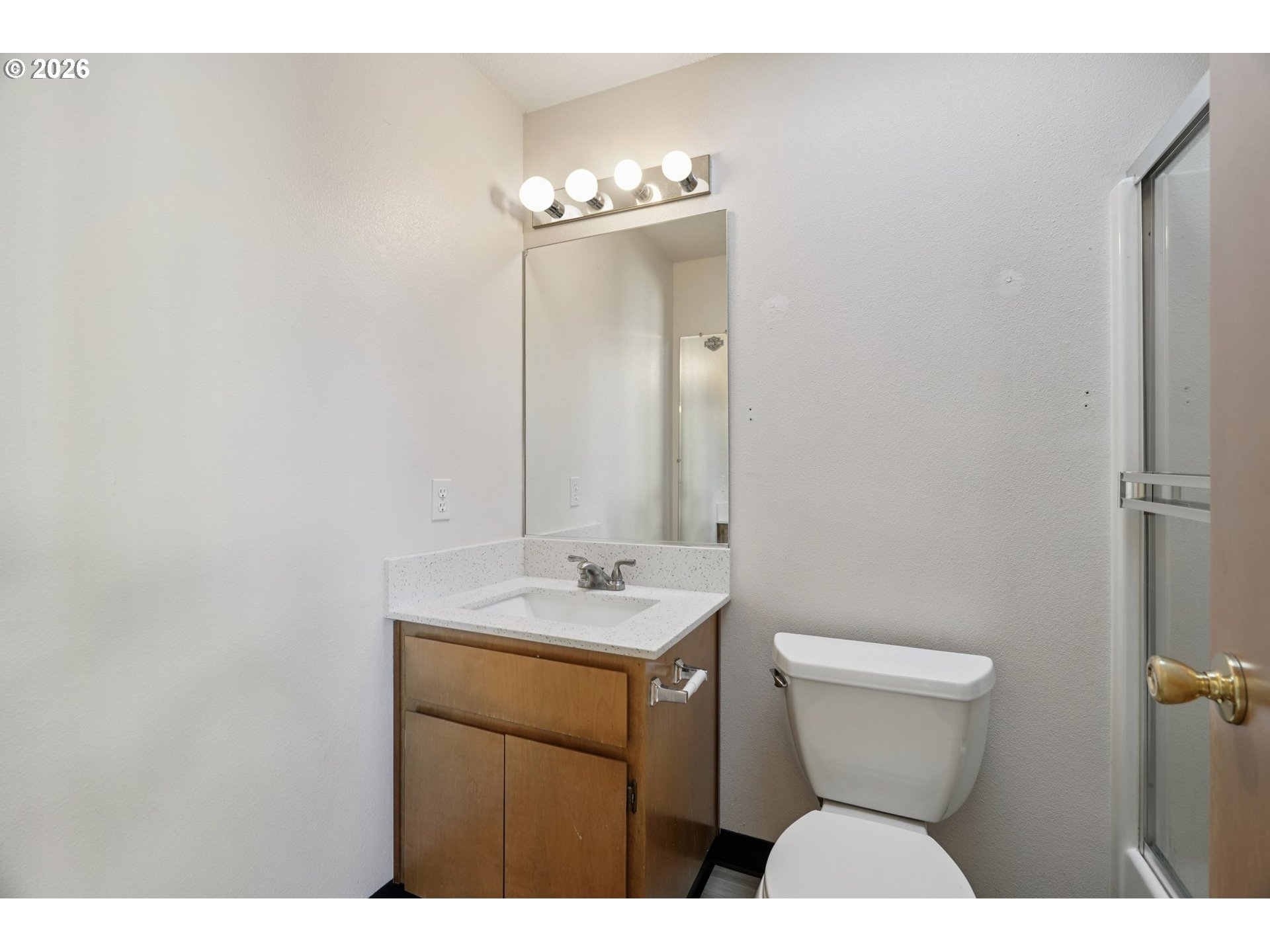 7306 Southeast 76th Avenue Portland, OR 97206 - Photo 21 of 34 a bathroom with a sink toilet and mirror