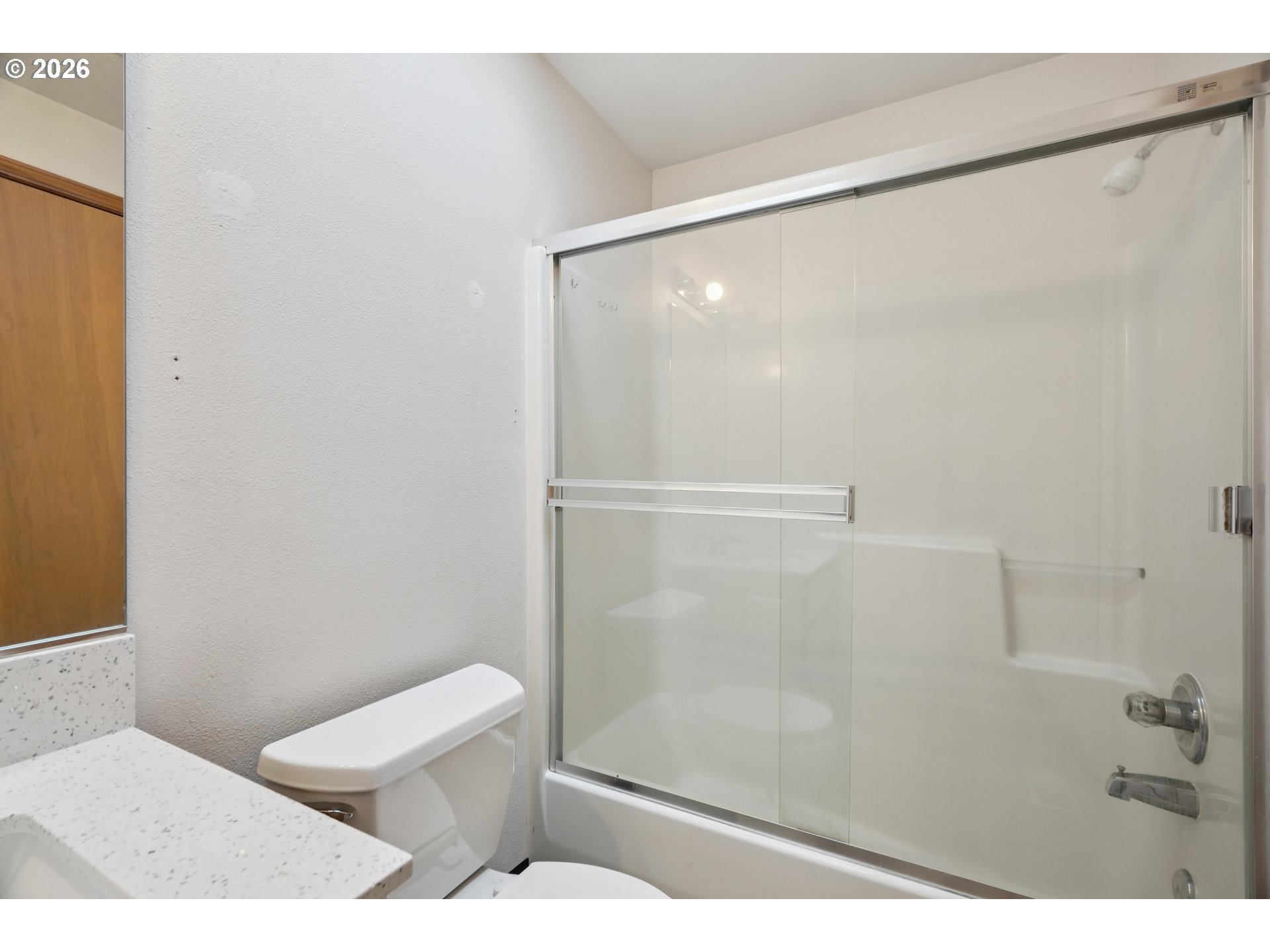 7306 Southeast 76th Avenue Portland, OR 97206 - Photo 22 of 34 a bathroom with a shower and toilet