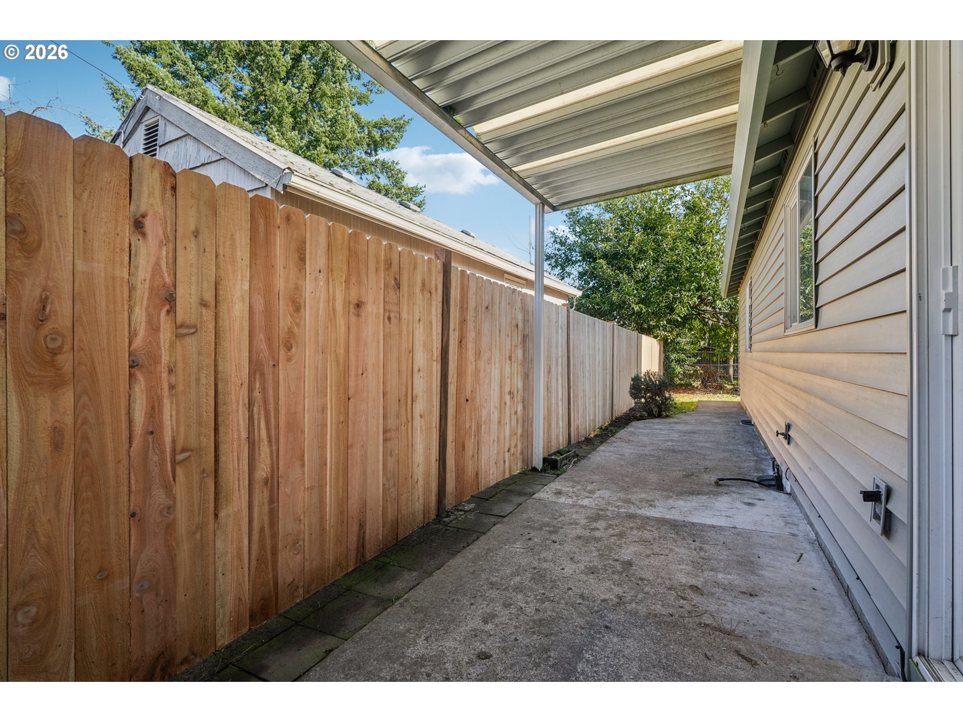 7306 Southeast 76th Avenue Portland, OR 97206 - Photo 26 of 34 a view of a backyard with pathway