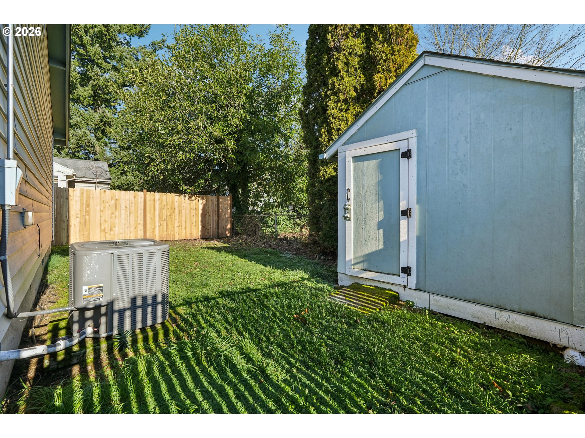 7306 Southeast 76th Avenue Portland, OR 97206 - Photo 32 of 34 a view of a house with a back yard