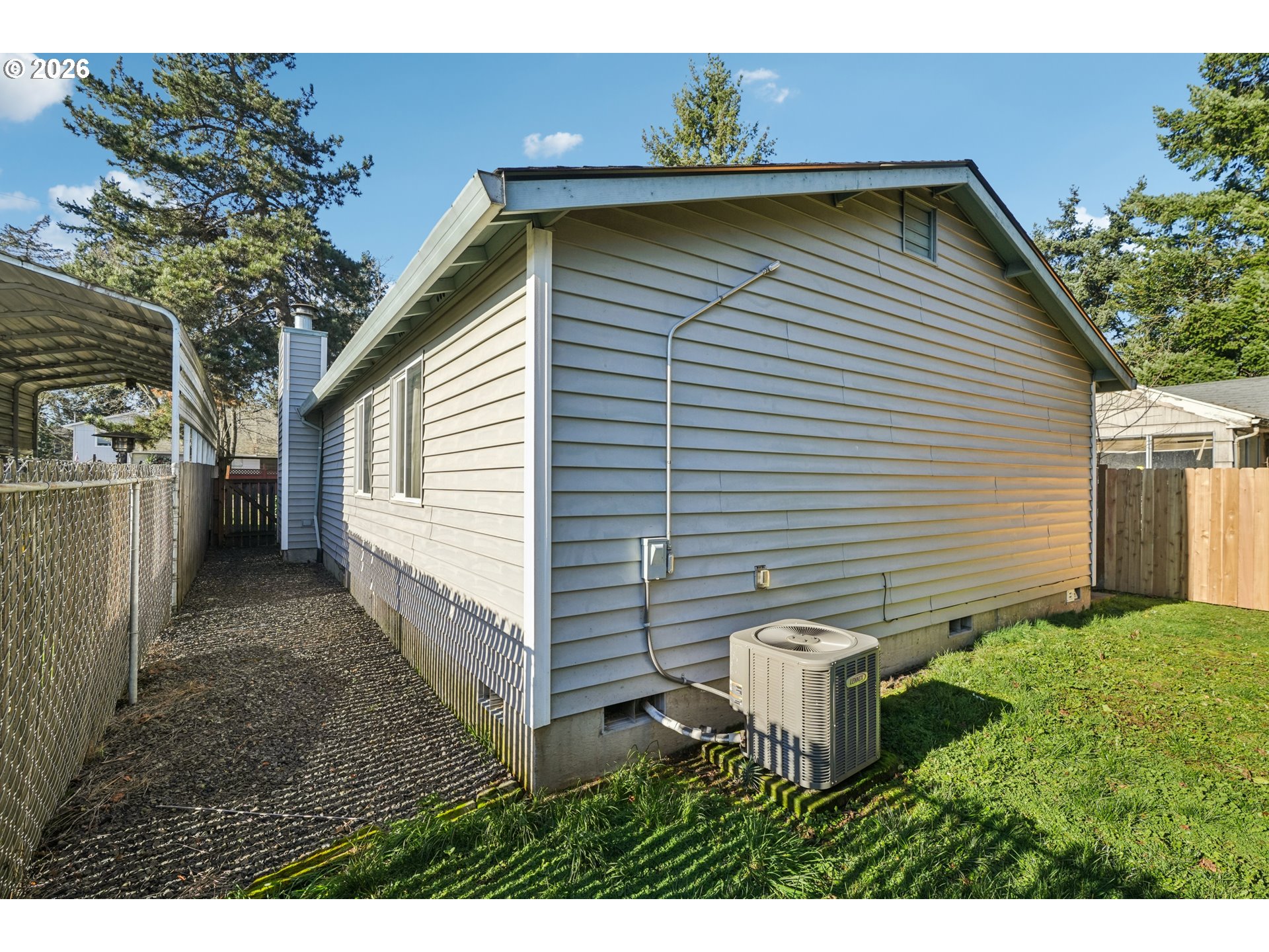 7306 Southeast 76th Avenue Portland, OR 97206 - Photo 33 of 34 a view of a house with a yard and potted plants
