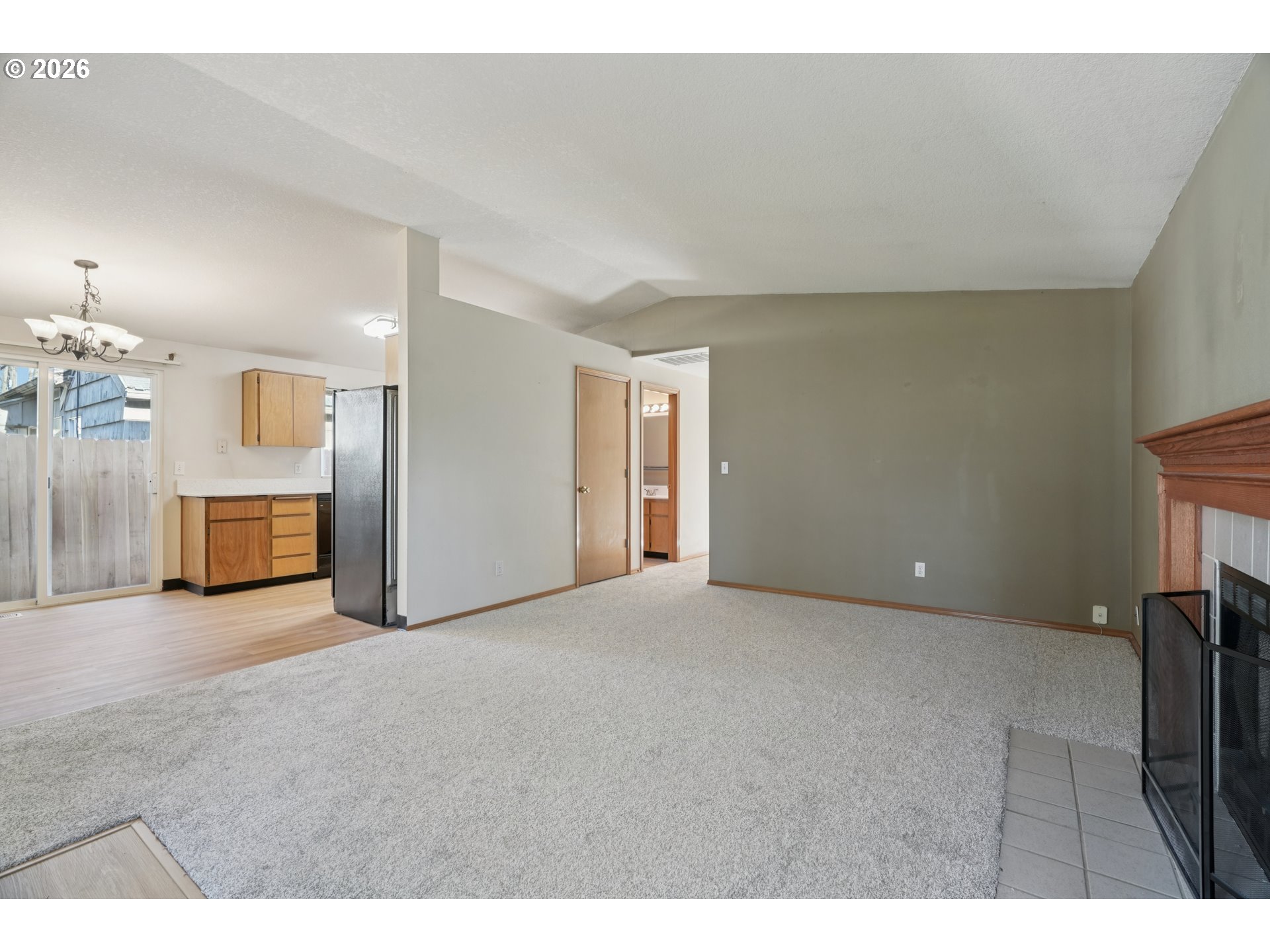 7306 Southeast 76th Avenue Portland, OR 97206 - Photo 5 of 34 a view of a livingroom with a fireplace