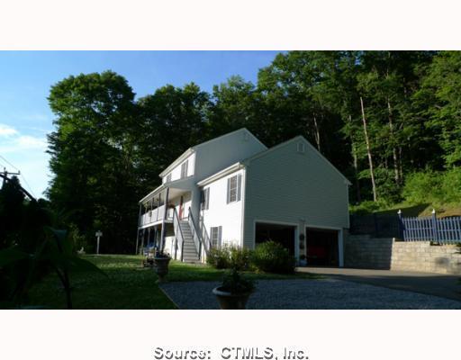 496 Chestnut Tree Hill Road Oxford, CT 06478 - Photo 1 of 1 a black and white photo of a house