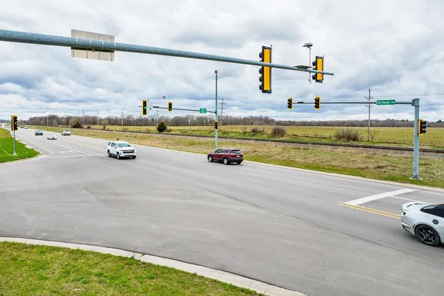 a view of a swimming pool and an outdoor seating