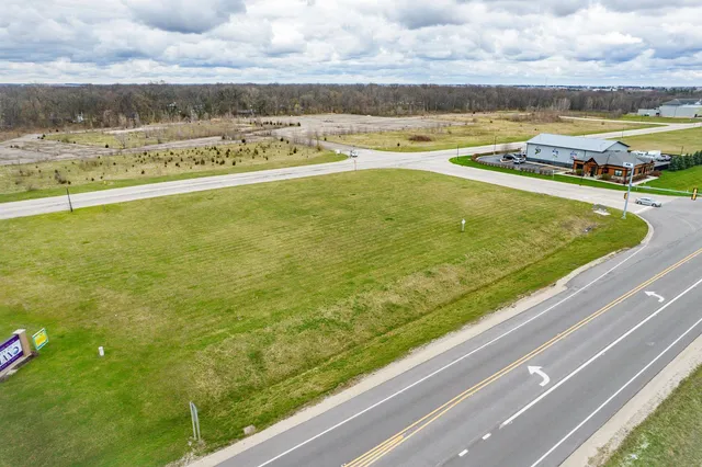 a view of a swimming pool with an outdoor seating