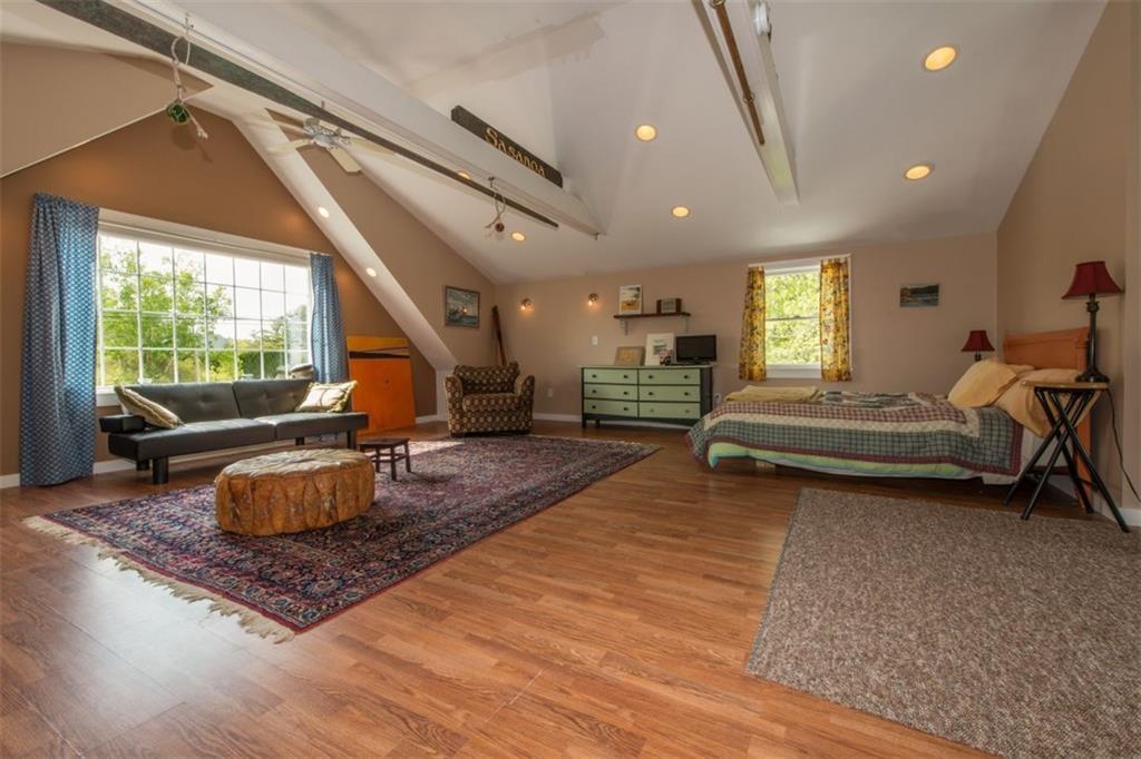 684 Wiscasset Road Boothbay, ME 04537 - Photo 20 of 26 The master bedroom with vaulted...