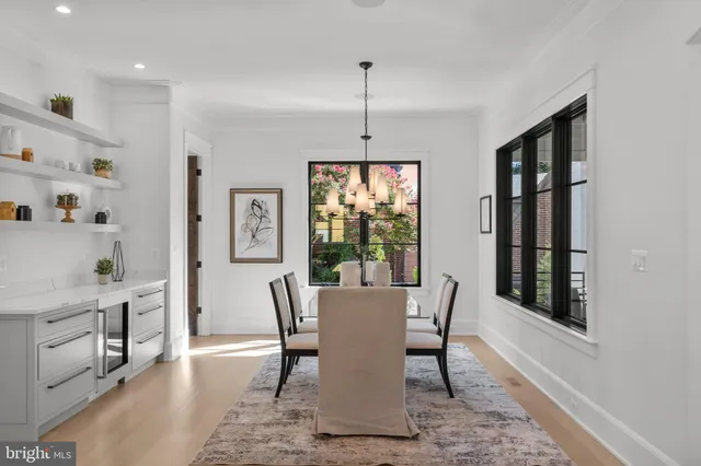 a dining room with furniture window wooden floor