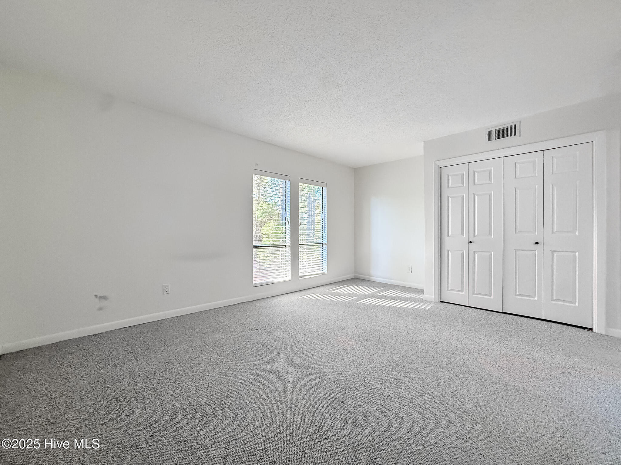 10 Pine Tree Road, Unit 203 Pinehurst, NC 28374 - Photo 24 of 42 Primary Bedroom w/Two Separate Closets