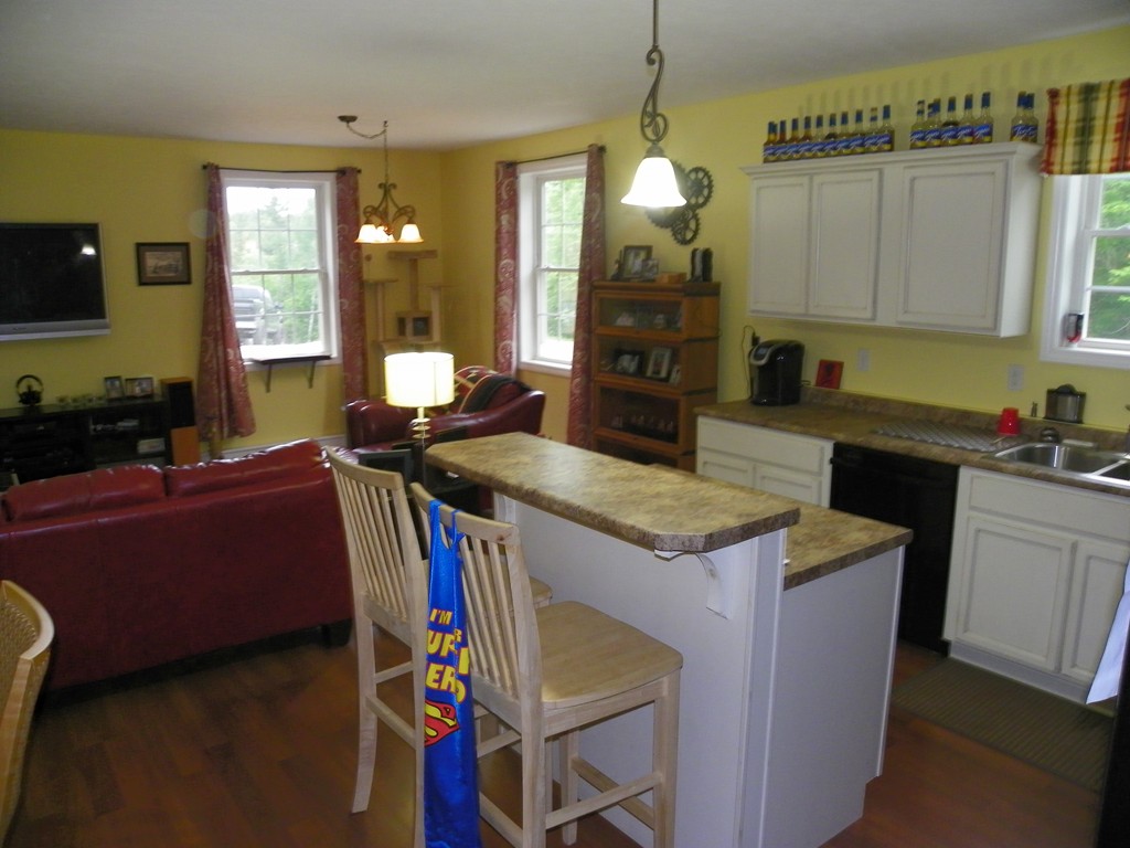 755 Old New Ipswich Road Rindge, NH 03461 - Photo 3 of 20 a kitchen that has a sink and a stove in it