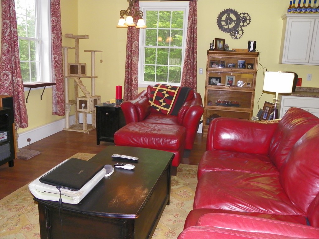 755 Old New Ipswich Road Rindge, NH 03461 - Photo 9 of 20 a living room with furniture and a window