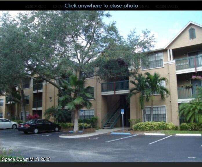 7667 North Wickham Road, Unit 805 Melbourne, FL 32940 - Photo 1 of 30 FRONT