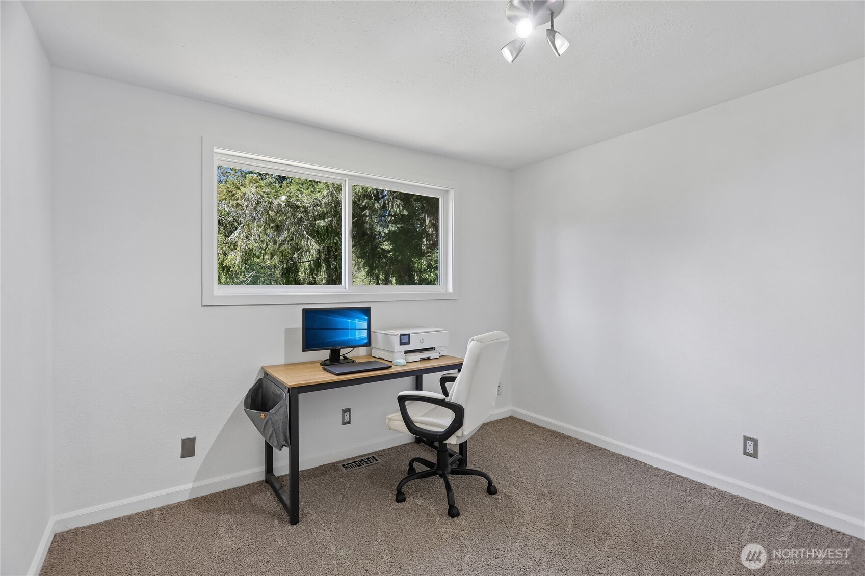 28601 Southeast 225th Street Maple Valley, WA 98038 - Photo 14 of 40 a view of a workspace with a window
