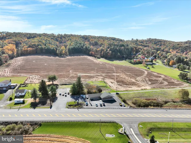 a view of a swimming pool with a mountain view