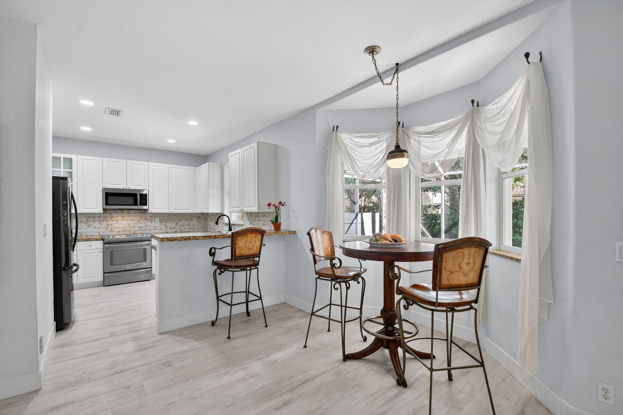 1605 East Classical Boulevard Delray Beach, FL 33445 - Photo 12 of 34 Breakfast Nook and Kitchen