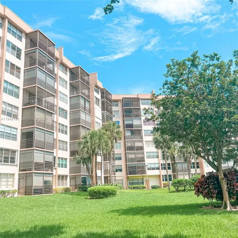 a view of building with garden