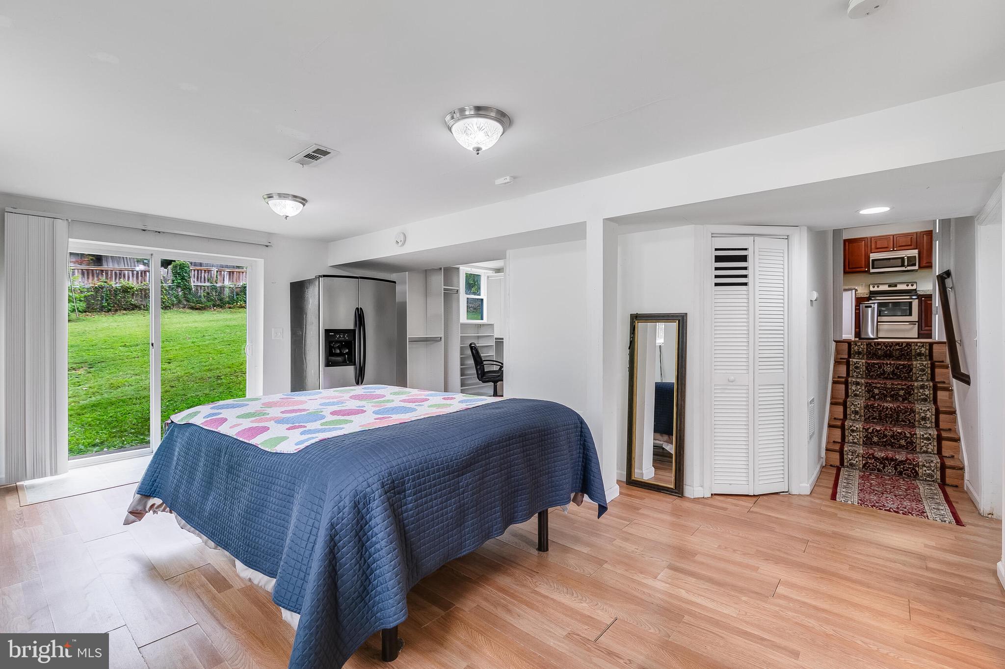 6624 Telegraph Road Alexandria, VA 22310 - Photo 15 of 36 a bedroom with a bed and a window