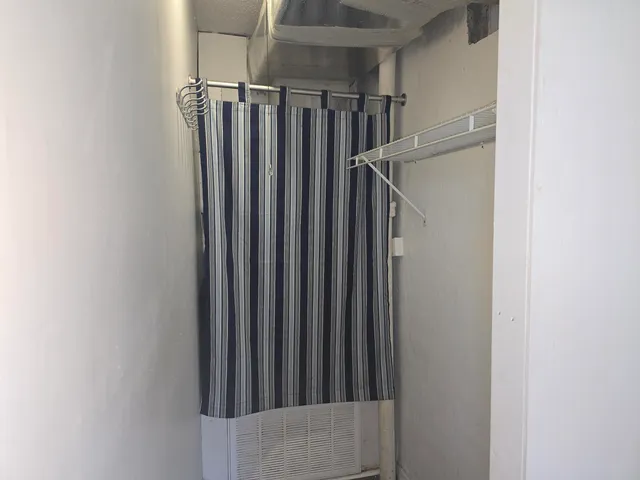 a view of a room with stairs