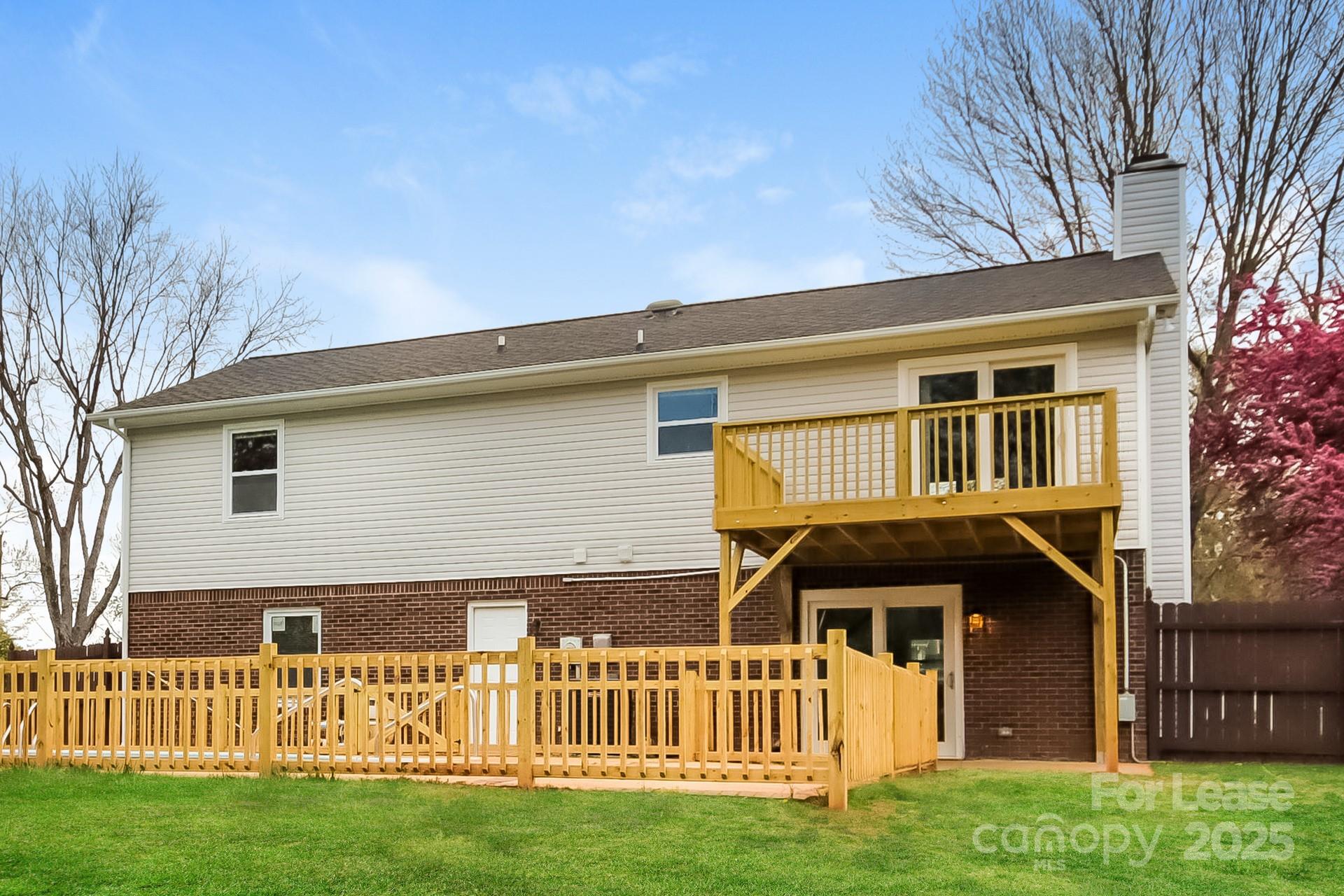 148 Mooreland Road Mooresville, NC 28117 - Photo 15 of 17 a front view of a house with a garden