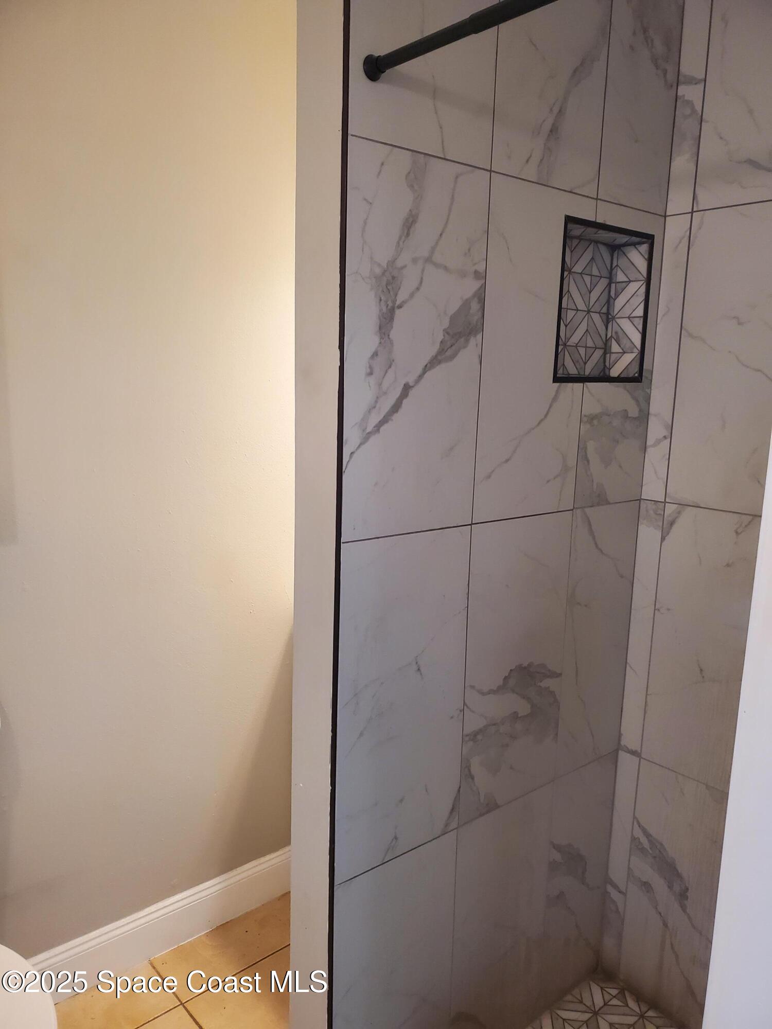 1105 Santa Rosa Drive Rockledge, FL 32955 - Photo 15 of 16 a bathroom with a shower