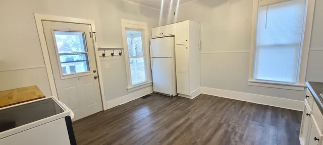 a view of a back yard of the house