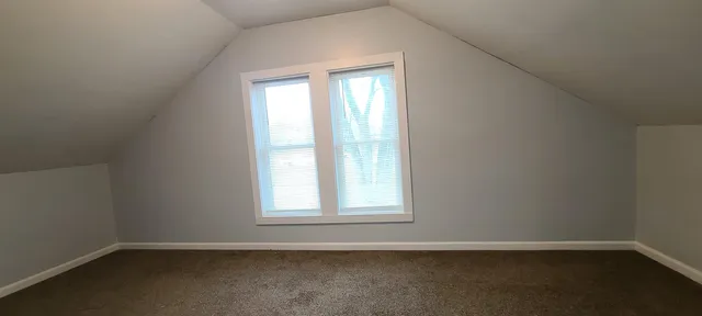 a bathroom with a sink a bathtub and a mirror